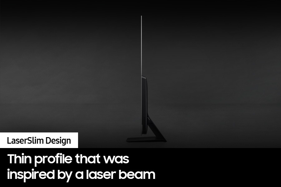 An OLED TV is displayed sideways to show its LaserSlim design.