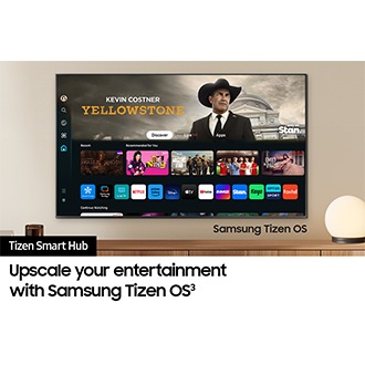 A wall-mounted TV shows popular apps and curated content on the "Samsung Tizen Smart Hub" home menu.