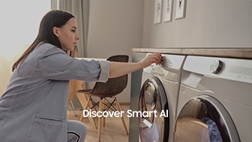 A female operating Samsung smart washer