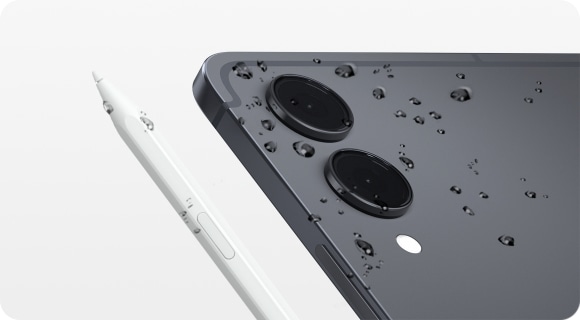 A close-up of Galaxy Tab S11 Ultra and S Pen with water droplets across the devices to demonstrate their IP68 water resistance for added durability in everyday conditions.