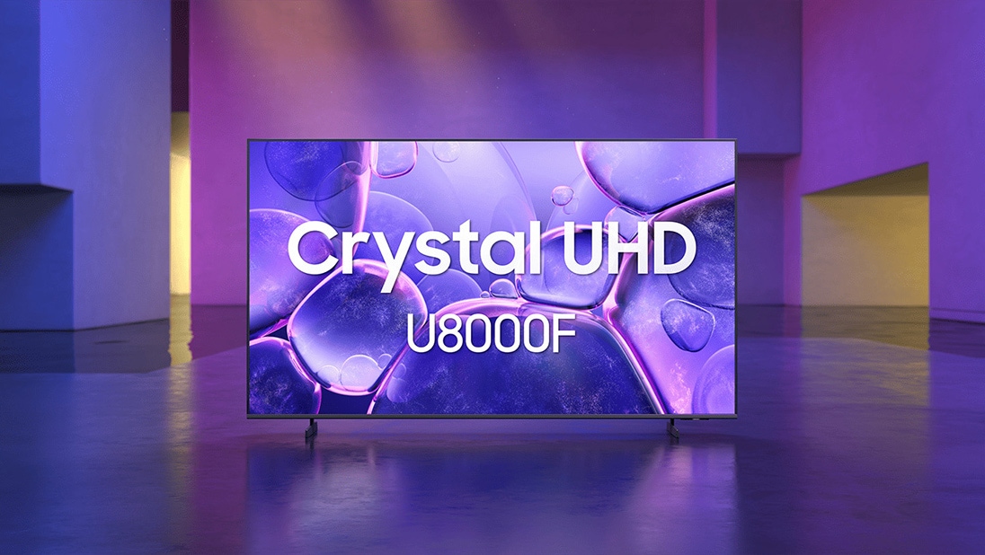 Samsung Crystal UHD U8000F TV u ljubičastom zatvorenom prostoru prikazuje apstraktni prizor ljubičastih mjehurića.