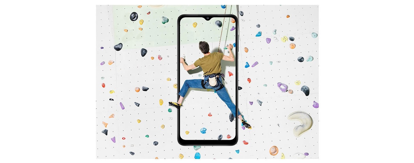 A guy climbing in motion captured in Galaxy A12 display, utilizing 6.5 inch Infinity-V display feature.