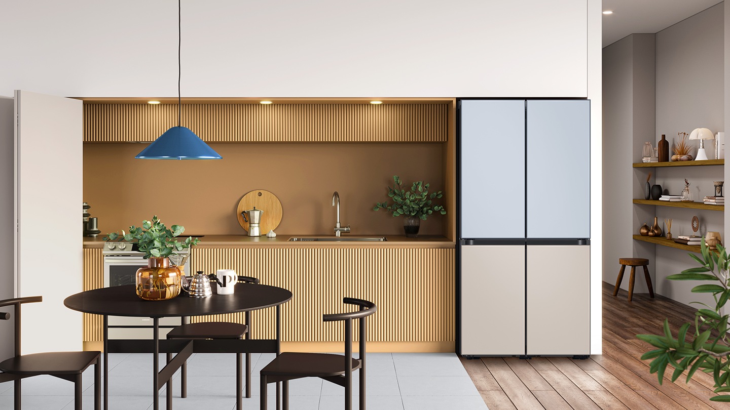 Placed in a stylish kitchen, the refrigerator has a two-tone finish that blends seamlessly with the tones of the room.