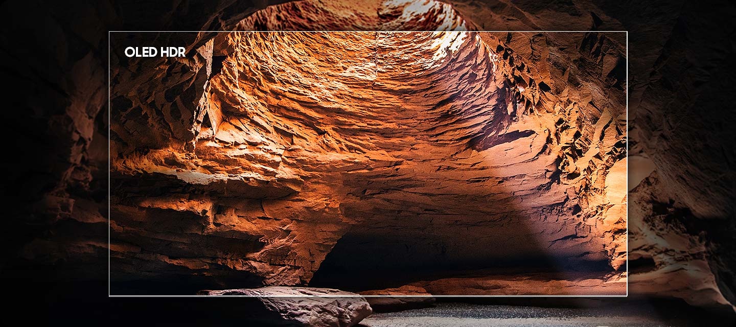 A scene of a water cave is enhanced by OLED HDR for improved picture clarity, so it seems the screen is part of real life.
