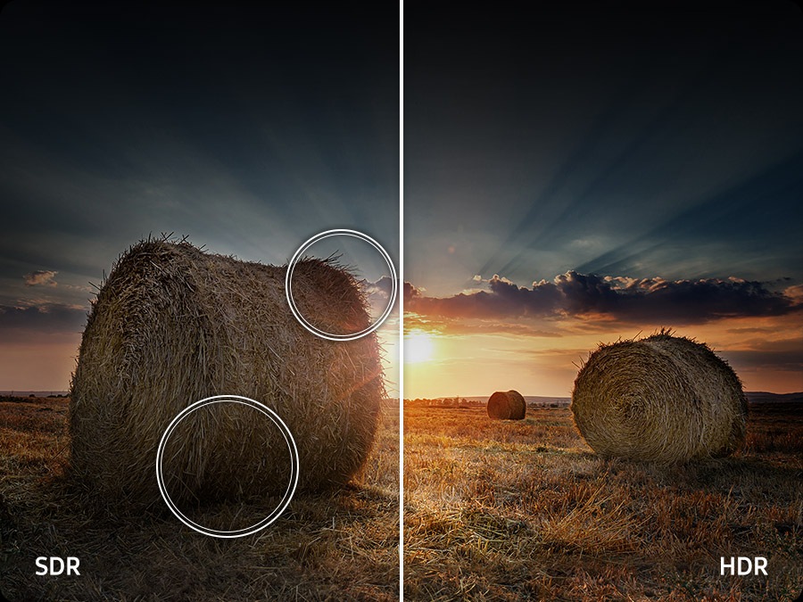 The sun is setting over a wide field with emphasis on a large hay stack. The scene after applying HDR technology is much brighter and crisper than the SDR version.