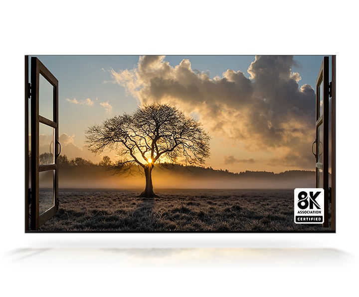 The sun sets out the window and there is a thin tree in a wide field. QLED 8K TV is certified by the 8K Association.