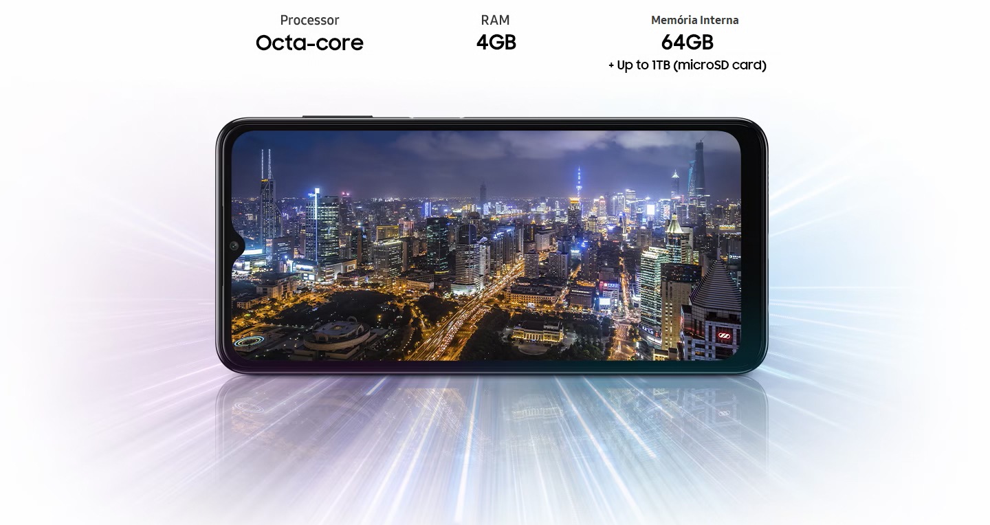 O Galaxy A04s mostra a vista noturna da cidade, indicando que o dispositivo oferece o processador Octa-core, 4GB RAM, 64GB com até 1TB de armazenamento.