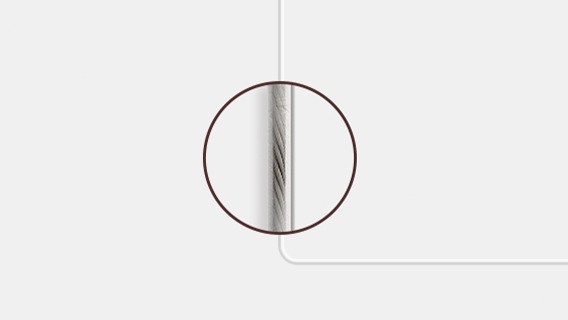 Closeup of One Invisible Connection cable shows its transparent material which greatly reduces its visibility.