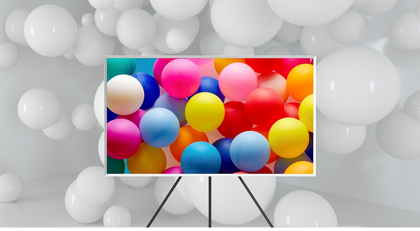 The Frame which is on Studio Stand is in a room full of white balloons. Only the balloons on the screen are visible in various vivid colours.