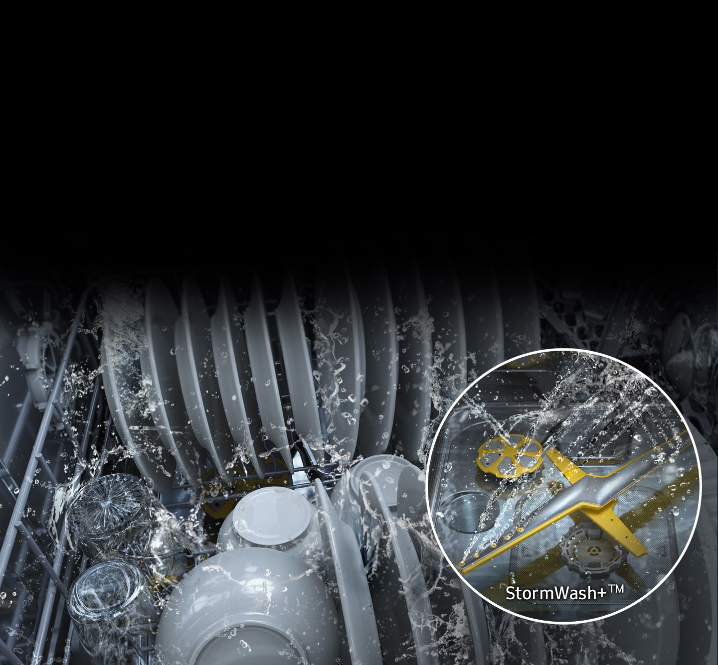 Shows the inside of the dishwasher, which is full of plates and dishes that are being washed. A close-up shows the StormWash+™ system’s circle-shaped spray jet and 2 washing arms spraying water in multiple directions inside the dishwasher.