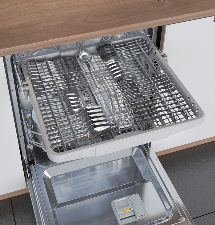 Shows the dishwasher with the door open and the third rack at the top pulled out, which contains cutlery and cooking utensils.