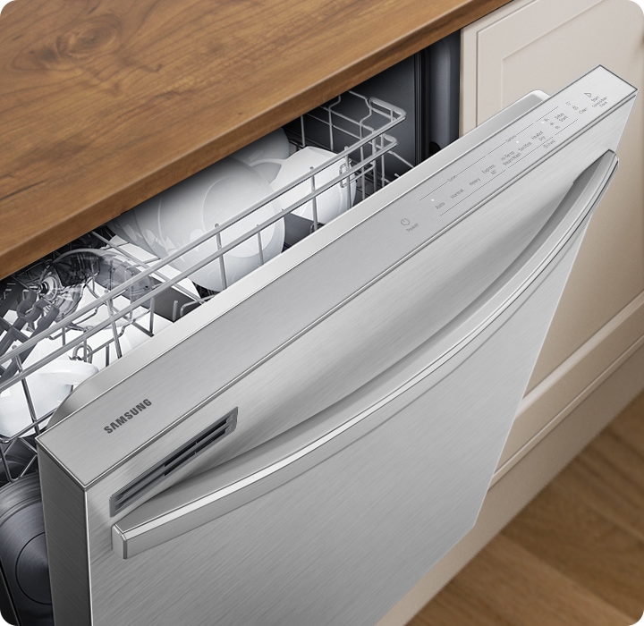 The dishwasher door is slightly open and shows the ergonomic hidden touch control panel on top of the door.