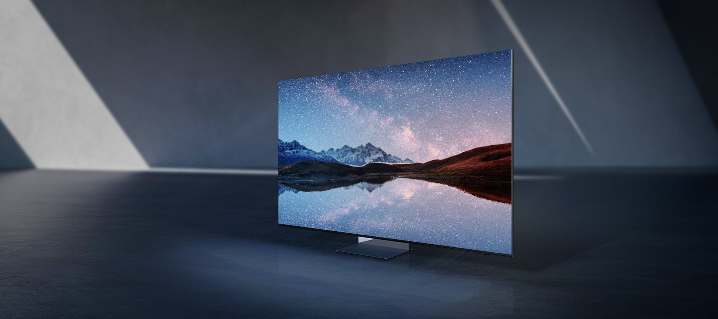 The slim Infinity screen's profile shown against a starry night sky. The screen rotates to reveal the entire front of the TV's Infinity Air Design and the rest of the mountainous skyscape captured on its screen as it disappears from the background.