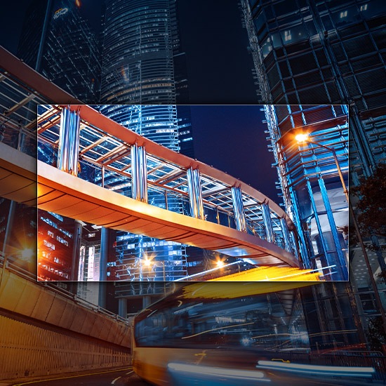 Crystal UHD TV highlights the details of a busy cityscape in the background with colorful details and enhanced clarity.