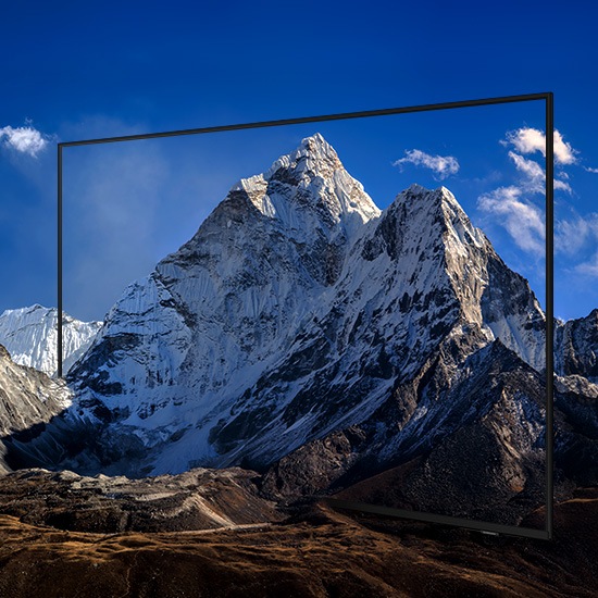 A grand mountain range is encased with thin lines depicting the TV's minimalistic and boundless bezels.