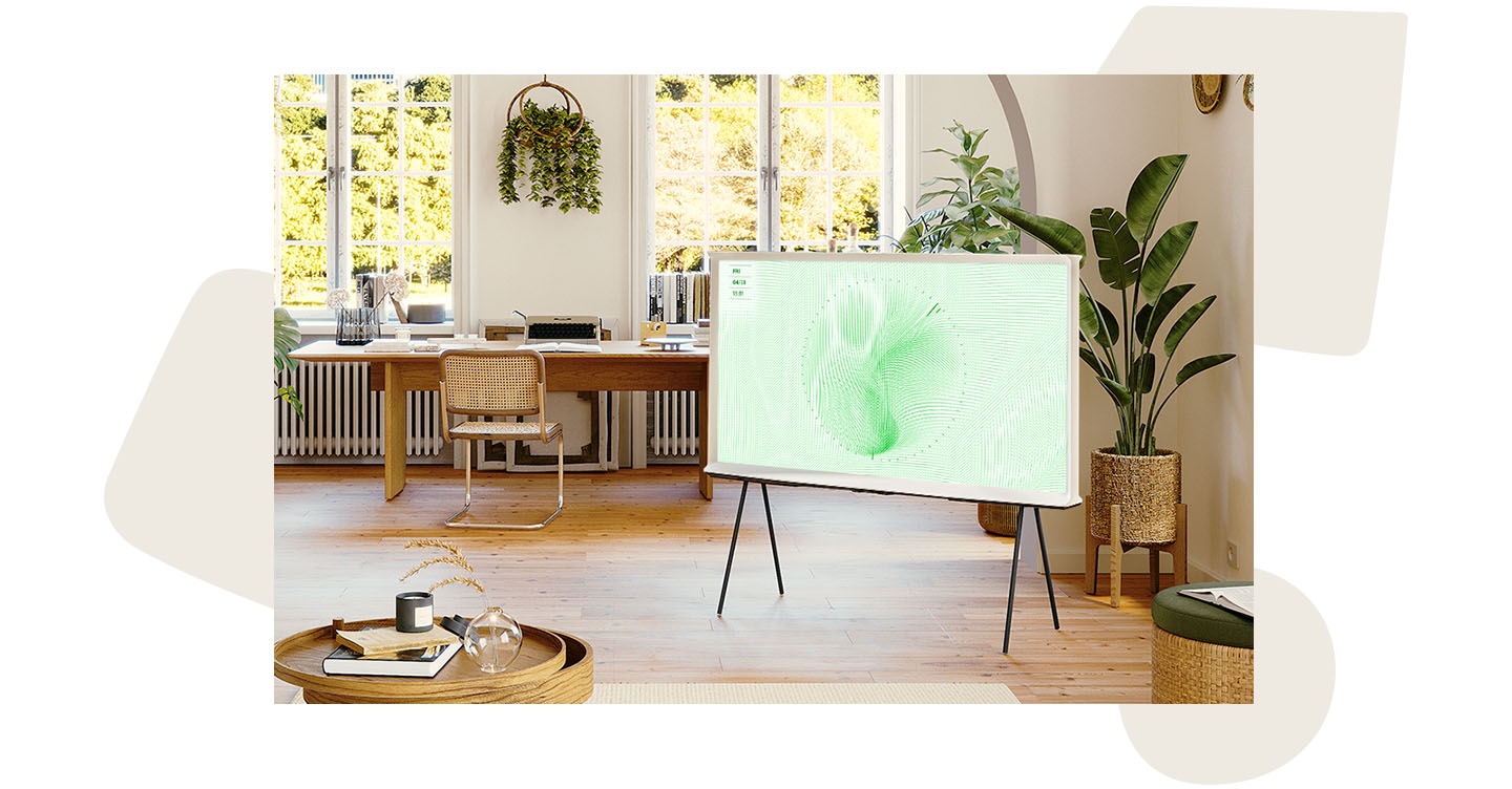 In a contemporary living space, The Serif TV cycles through different patterns on screen in Ambient Mode.