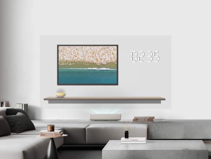 The Premiere projects an ambient screen onto the wall that displays a scene of ocean waves and a time of 2:35 am.