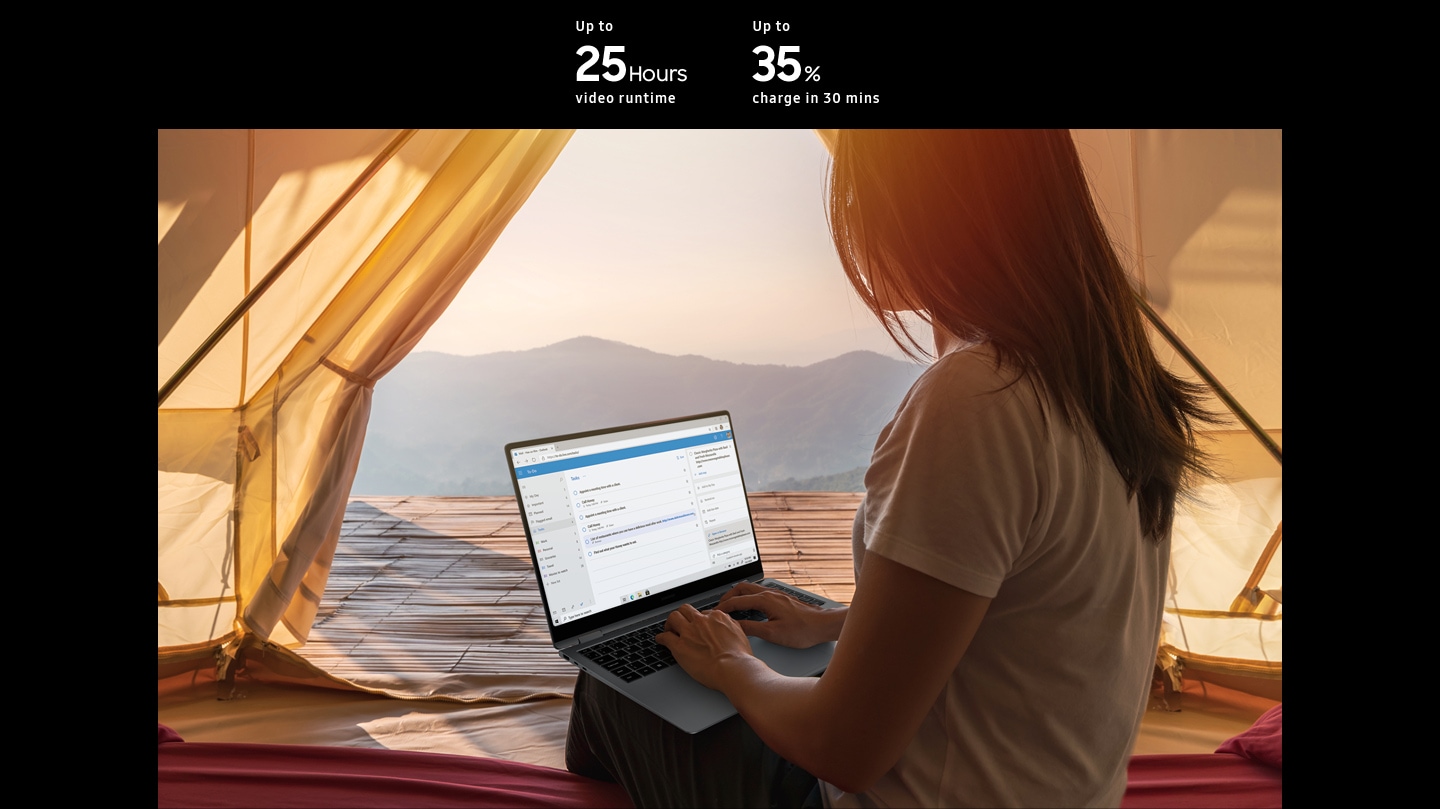 A woman is using Galaxy Book5 Pro 360 with Microsoft Outlook app open onscreen without a charger worry-free in a tent outdoors. Up to 25 hours. Up to 35% in 30 mins.