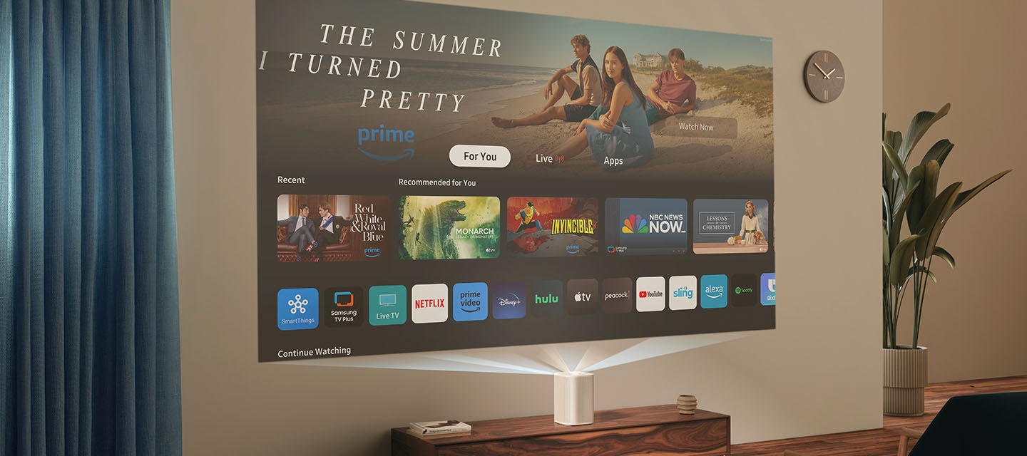 The Premiere projects the home screen of Samsung Tizen OS onto the wall, which displays various apps and streaming options.
