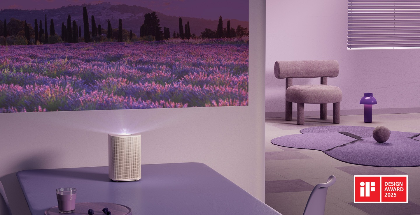The Premiere projects a field of purple flowers onto the wall of a living room decorated with purple furniture and decor.