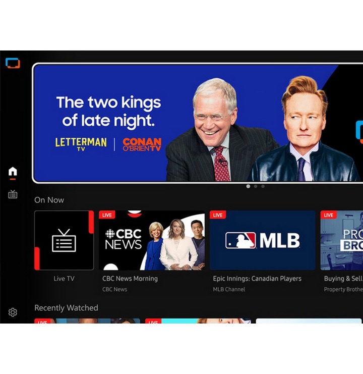 TV in a living room shows Samsung TV Plus home screen and the diverse TV channels available with it.