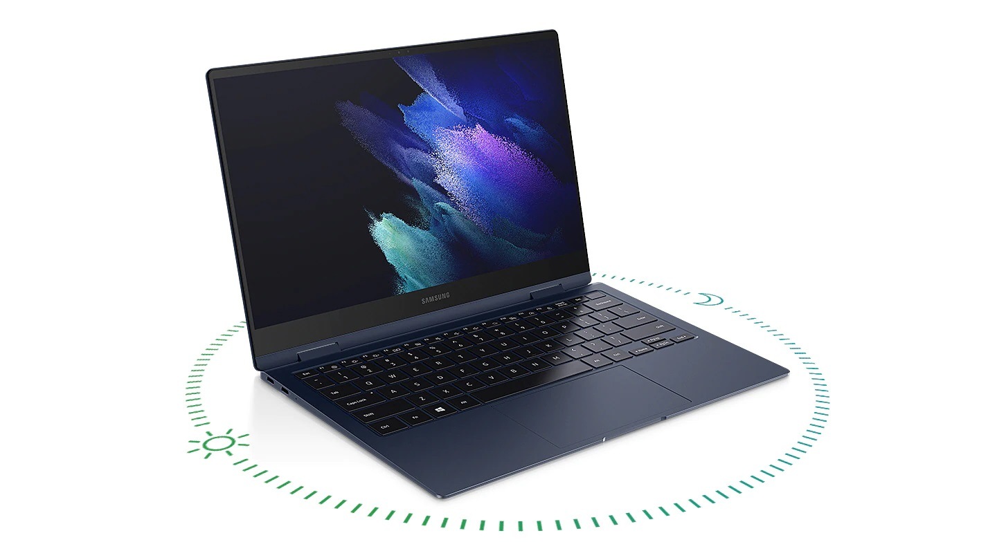 Um Galaxy Book Pro 360 colocado no meio, com pontos circulares verdes na parte inferior, indicando que a bateria dura longas horas