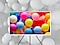 The Frame is displaying many balloons  in a wide variety of colors.