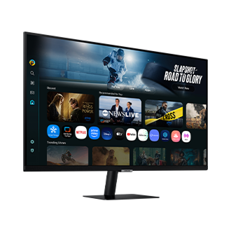 Front-left perspective of 32 inch Samsung Smart Monitor M7. Screen showing Smart TV Apps page with various content and apps lined up.