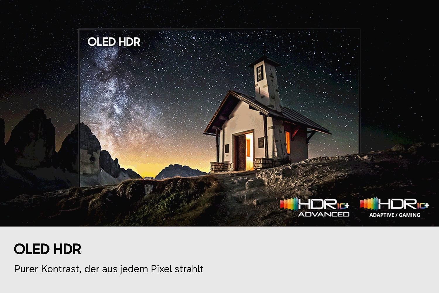 Die kleine Kapelle unter dem sternenklaren Nachthimmel zeigt die Qualität von OLED HDR. Die Milchstrasse ist sichtbar und bringt lebendige, klare Details zur Geltung. Felsige Berge zeichnen sich am Horizont ab.