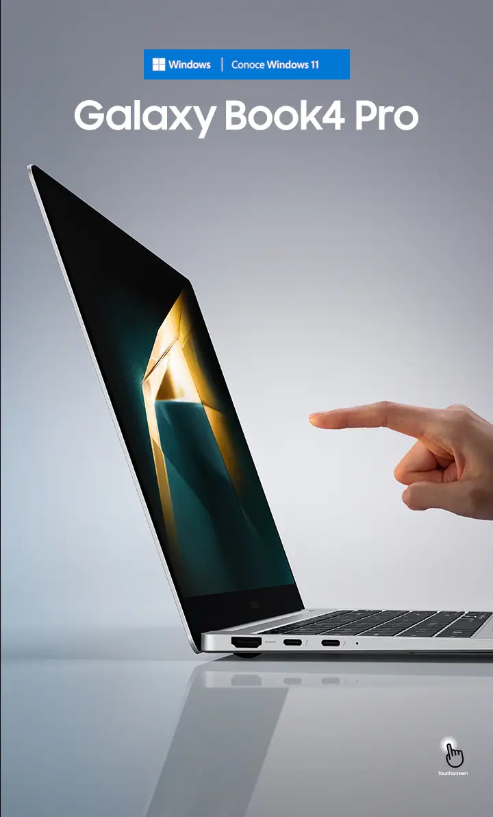 La Galaxy Book4 Pro en Platinum Silver está abierta, mirando hacia la derecha con un fondo de pantalla verde oscuro y amarillo, y la mano de una persona a punto de tocar la pantalla con un dedo índice. Se muestra el icono de pantalla táctil.