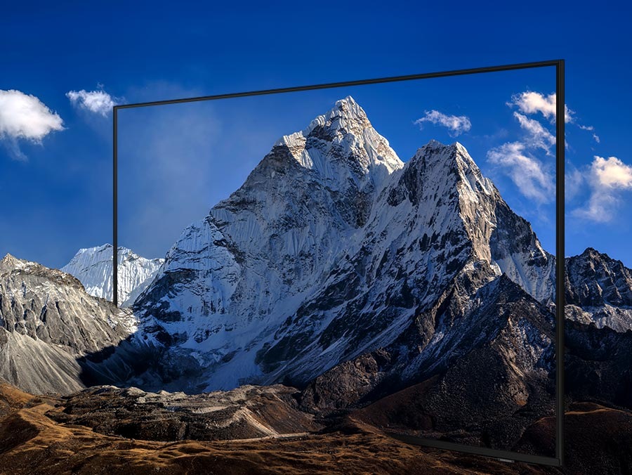 Una gran cadena montañosa está rodeada de líneas delgadas que representan los biseles minimalistas e ilimitados del TV.