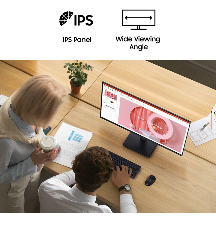 There are two people looking at a document on the Essential Monitor S3. And there are IPS and Wide Viewing Angle icons above them.