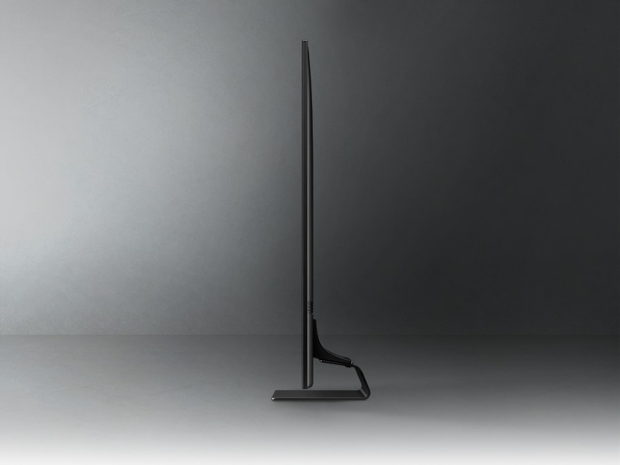 A side view of a QLED TV is on display exhibiting its ultra thin feature.