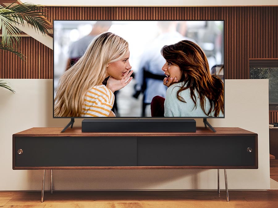 The sound from the Soundbar's side speakers emphasize dialogue when Voice Enhance is activated.