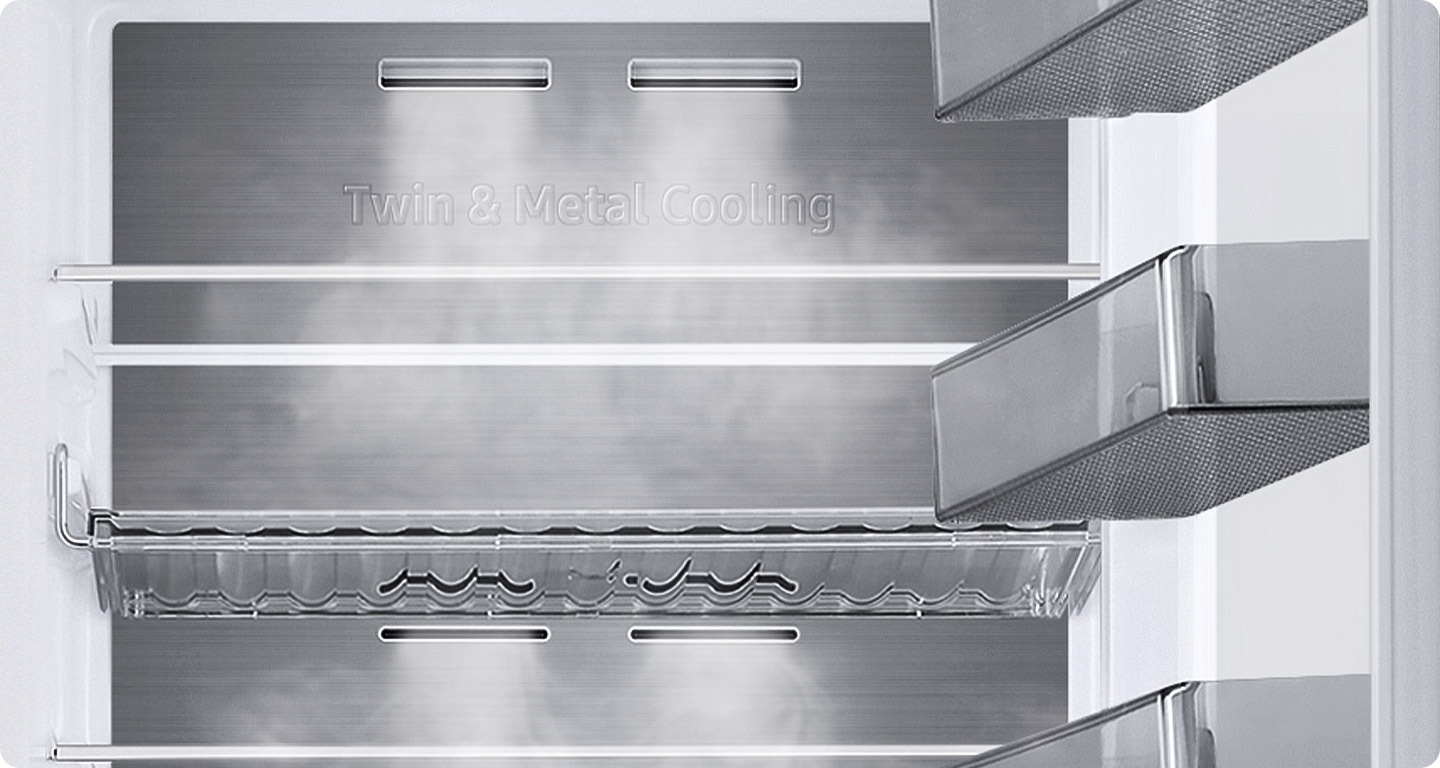 The Metal Cooling plates inside the refrigerator look extremely cold and the cold air flows around.