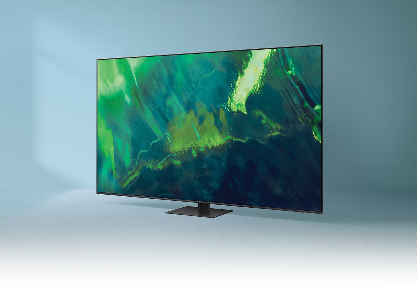 Q70A mostra una grafica a colori mescolata in modo complesso che dimostra i colori di lunga durata della tecnologia Quantum Dot.