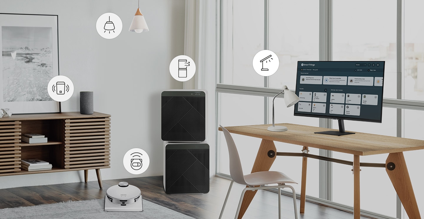 A room contains a desk with a smart lamp and monitor on top, smart air purifier, a smart robot vacuum, a smart hanging light and a smart speaker. Above each smart home item is an icon representing each item. Each icon is selected using SmartThings functionality which turns on each device.