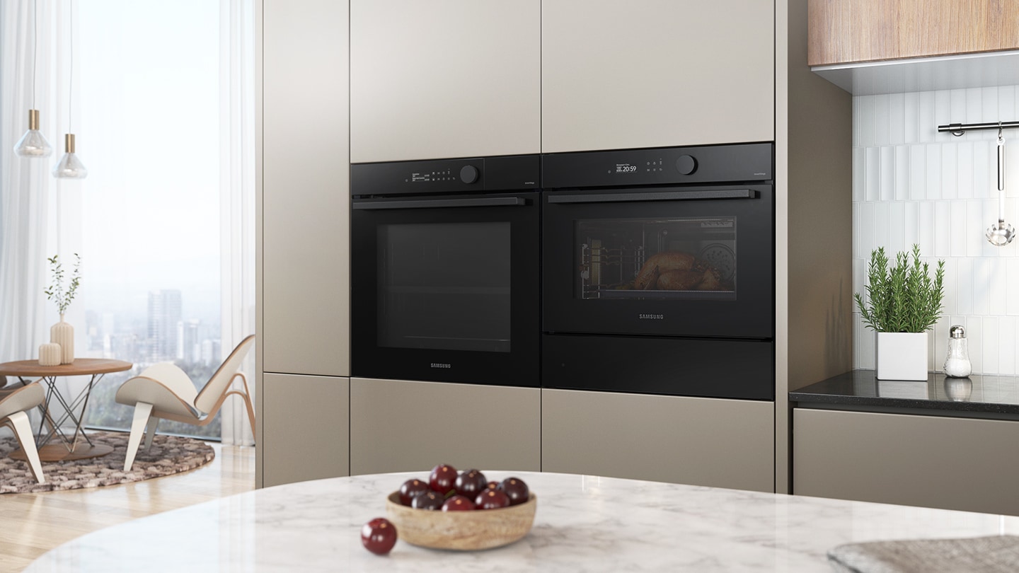 Shows the built-in oven seamlessly installed in a kitchen next to a Microwave Combi oven.