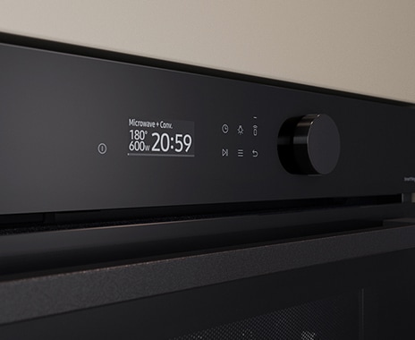 Shows a close-up of the oven's stylishly minimalist control panel with an LCD display, touch control and a single knob.