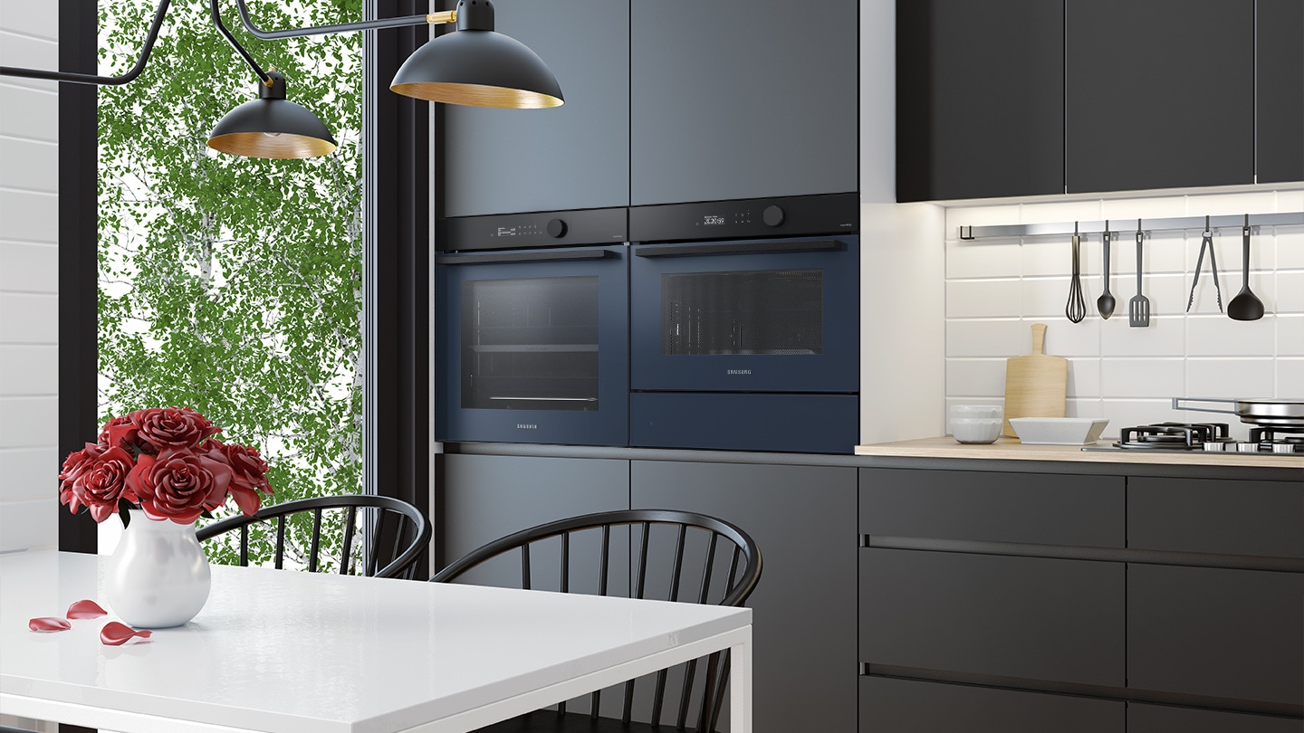 Shows the built-in oven seamlessly installed in a kitchen next to a Microwave Combo oven. Its BESPOKE 