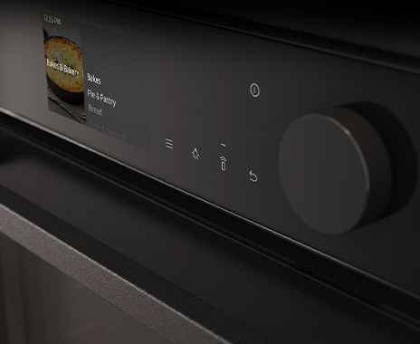 Shows a close-up of the oven's stylishly minimalist control panel with an LCD display, touch control and a single knob.
