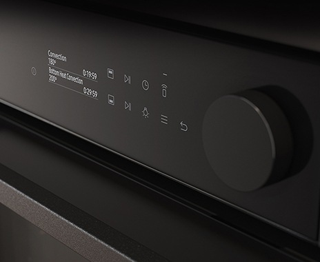 Shows a close-up of the oven's stylishly minimalist control panel with an LCD display, touch control and a single knob.