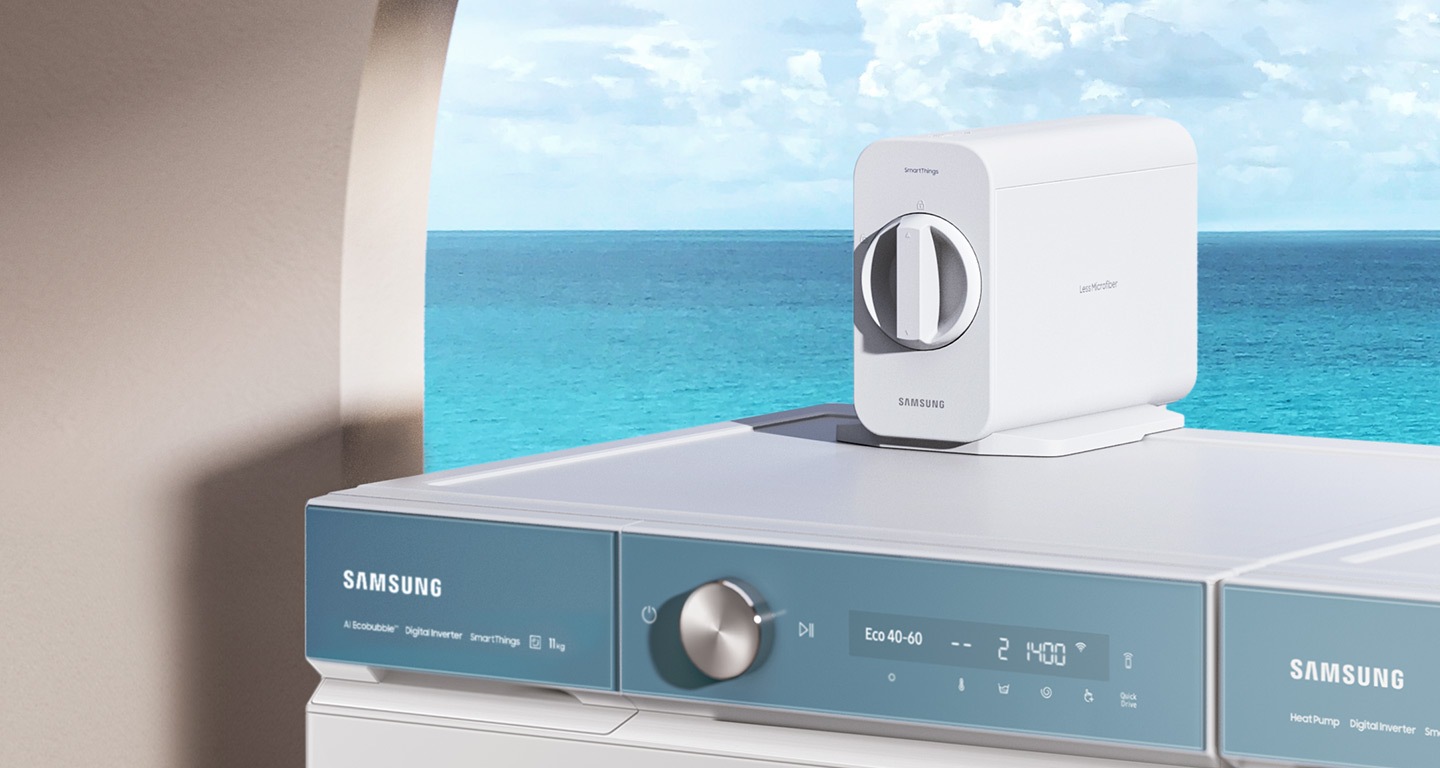 There is a Less Microfiber™ Filter installed on top of a Bespoke Grande AI washer. Behind it is a clear blue ocean.