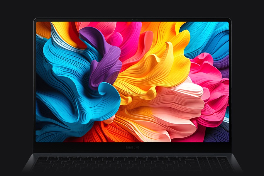 Das Galaxy Book4 Pro in Moonstone Gray ist geöffnet und zeigt nach vorne mit einem bunten Hintergrundbild auf dem Bildschirm.