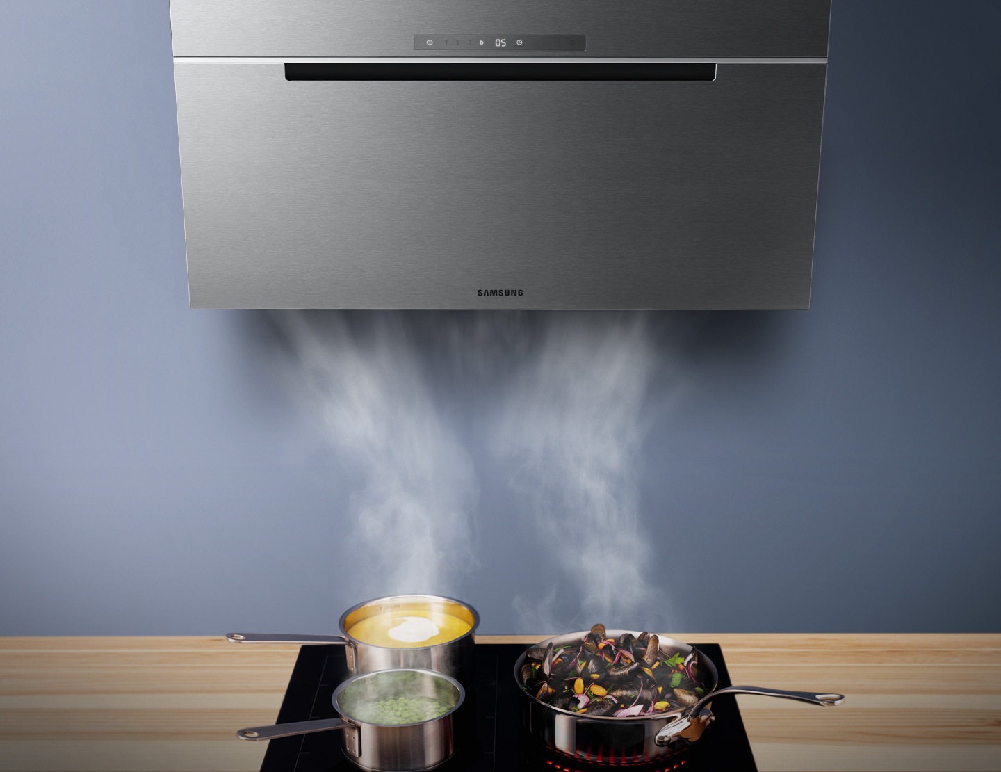 Smoke being sucked into the hood installed in the kitchen.