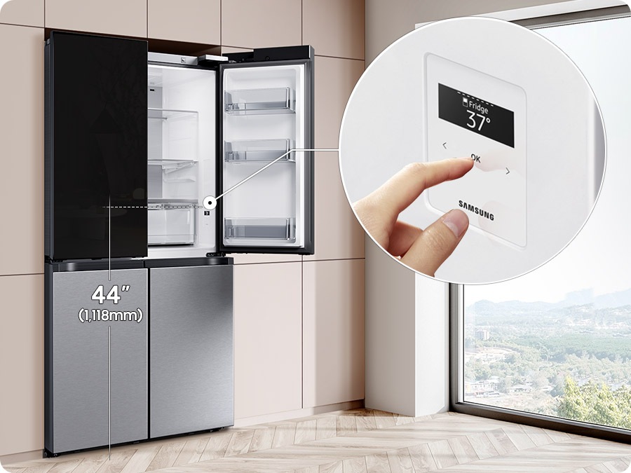 Inside the right bottom corner of the refrigerator is an internal display panel. It's seen that 37F. A finger is pressed OK.