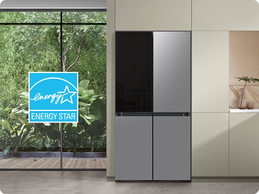 There is a Bespoke refrigerator in a sunlit kitchen. Next to its left is the ENERGY STAR certified seal.