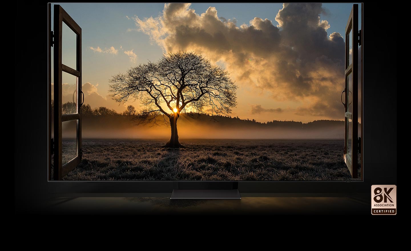 Contrast level of the sunset and a thin tree in a wide field as seen from inside a room is vivid. Neo QLED 8K TV is certified by the 8K Association.