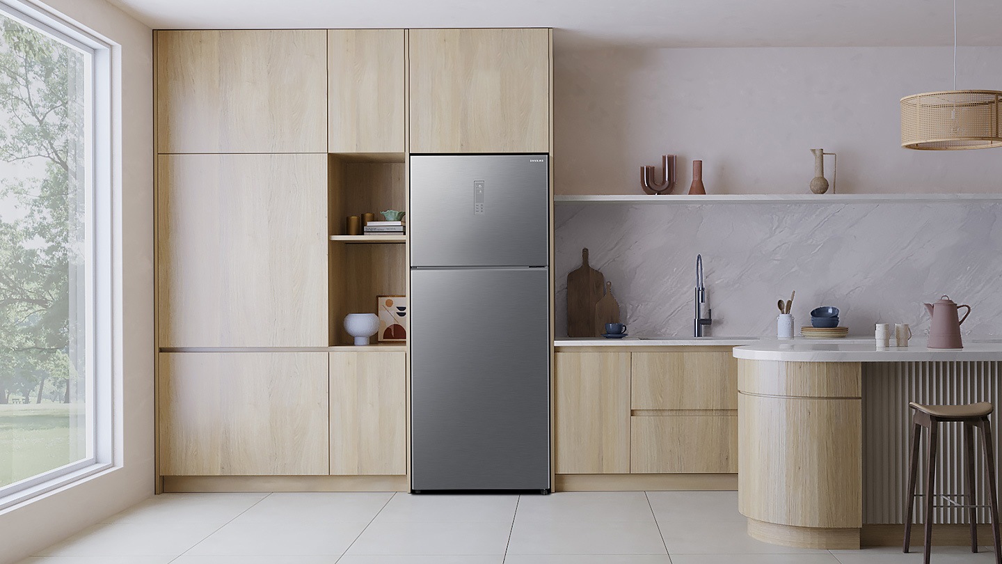 Sleek and Modern Design. The refrigerator is installed in the Kitchen.