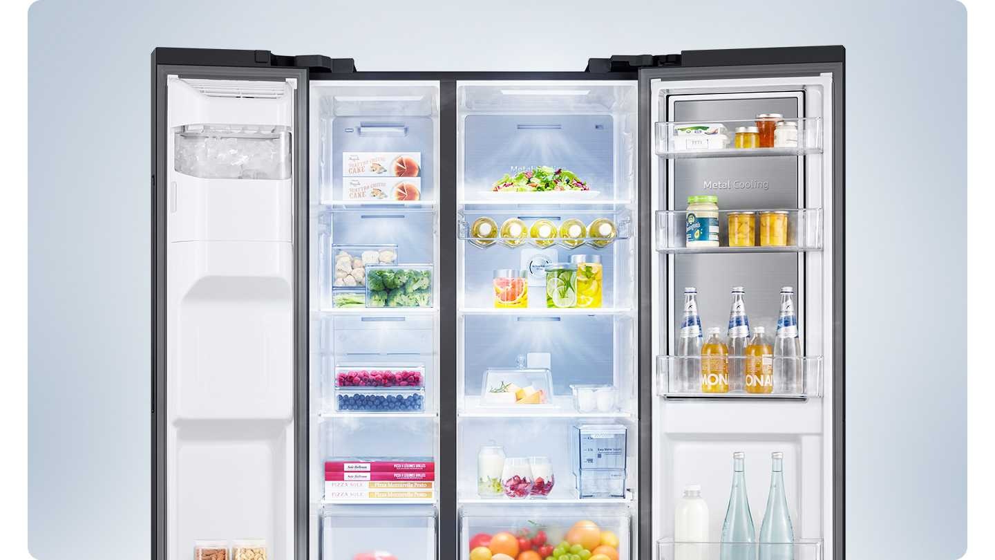 A 2-door fridge is open fully with food inside, and fresh air is coming out from the top of each compartment.
